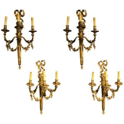 Large Three-Light Torch and Ribbon Form Wall Sconces - Set of 4