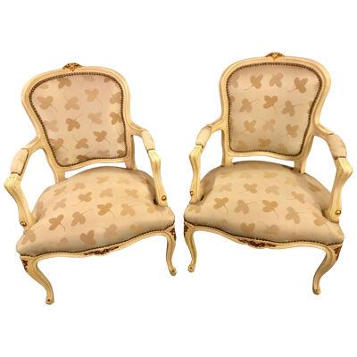 Pair of French Louis XV Style Parcel-Gilt and Paint Decorated Bergere Chairs