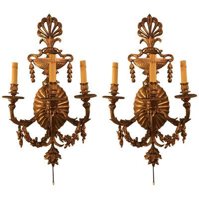 Pair of Bronze Three-Light Sconces in an Urn Form