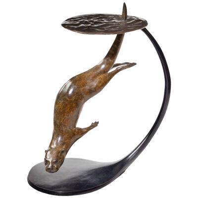 A Large Contemporary Patinated Bronze Diving Otter By Matt Duke Entitled Junior