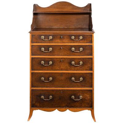An Unusual George III Tall Chest With Gallery