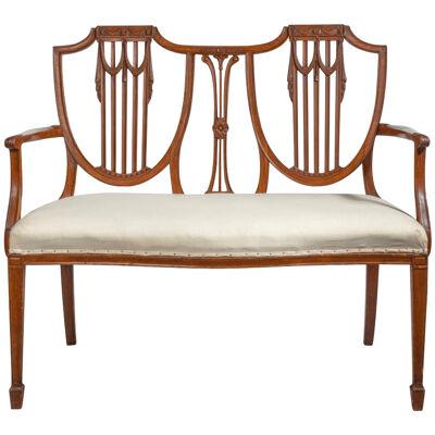 A Satinwood Sheraton Revival Settee Attributed To Gillow