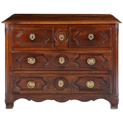 An 18th Century Walnut Commode Of Good Colour
