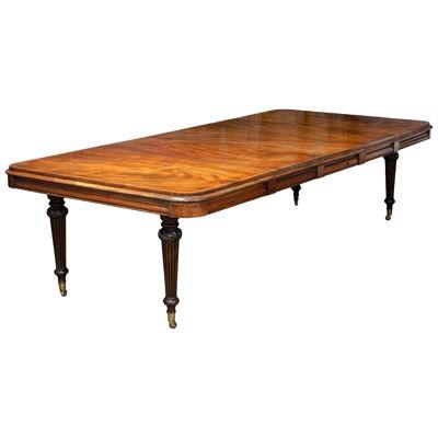 A Regency Period Figured Mahogany Extending Dining Table
