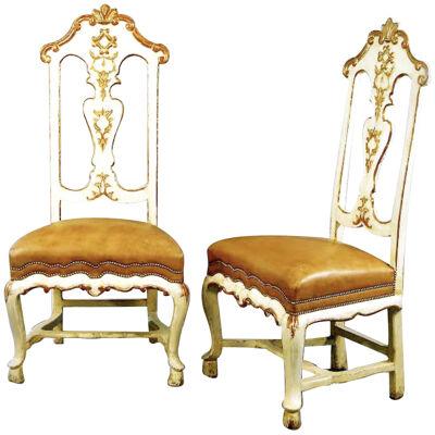 SET OF SIX SPANISH ROCOCO PAINTED AND PARCEL GILT SIDE CHAIRS