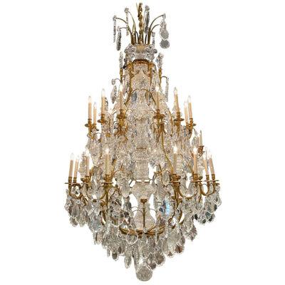 Palace Size Baccarat Style Gilt Bronze and Crystal 24 Light Chandeliers