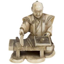 Netsuke of a craftsman figure 