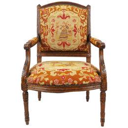 AF2-012: LATE 19TH CENTURY FRENCH LOUIS XVI STYLE CARVED WALNUT FAUTEUIL