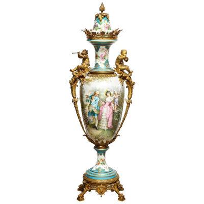 A Palatial French Ormolu-Mounted Sevres Porcelain Hand-Painted Vase and Cover