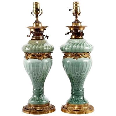 A Pair of French Theodore Deck Ormolu-Mounted Celadon Porcelain Lamps