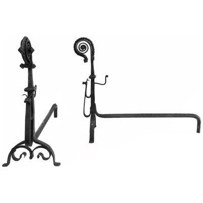 Pair of Tall Wrought Iron Andirons showing a Snail