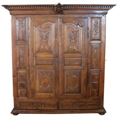 Early 18th Century Carved Walnut Antique Wardrobe or Armoire with Secrets