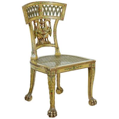 19TH CENTURY BIEDERMEIER CARVED AND PAINTED CANE CHAIR