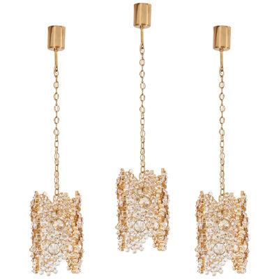 One of Three Palwa Gilded Brass and Crystal Glass Encrusted Pendant Lamps