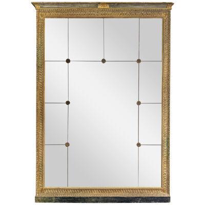 A large French Antique Panelled Gold Gilt Mirror In The Empire Style 