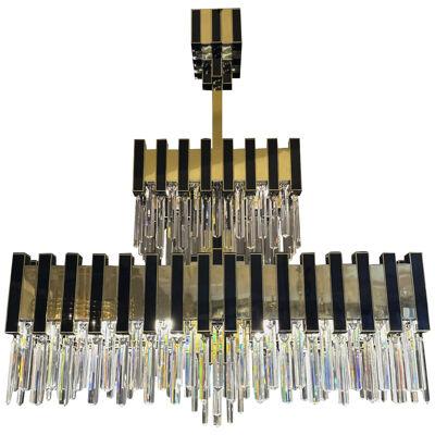 A large Brass and Crystal Chandelier By Willy Rizzo For BD Lumica 