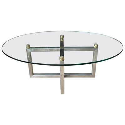 A Chrome and Brass Oval Cocktail Table by Peter Ghyczy