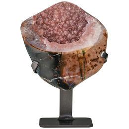 Small cut agatised geode with cotton candy interior
