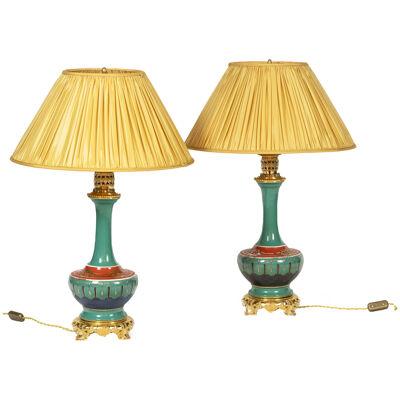 Pair of lamps in porcelain of Paris and gilded bronze. Circa 1850.