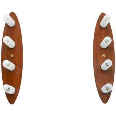 Maison Arlus, Pair of wall sconces in mahogany and opaline. 1960s.