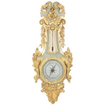 Cicery. Barometer in carved and gilded wood. 18th century period.
