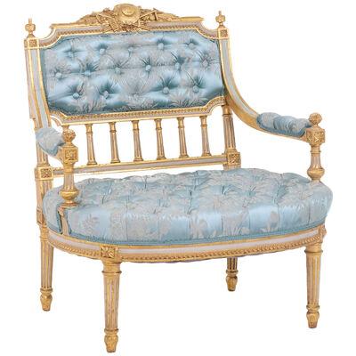 Louis XVI style fireside chair in gilded and lacquered wood. Circa 1880.