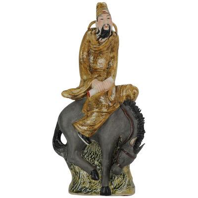 Chinese porcelain sculpture Man on Horse. Dated 1998. Created by Xu 