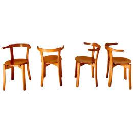 Vintage wood dining chairs in the style of Bruno Rey, set of four, Italy, 1970s