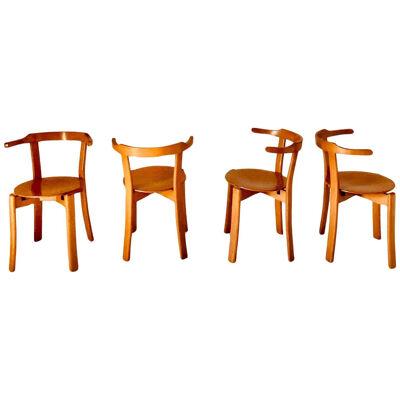 Vintage wood dining chairs in the style of Bruno Rey, set of four, Italy, 1970s