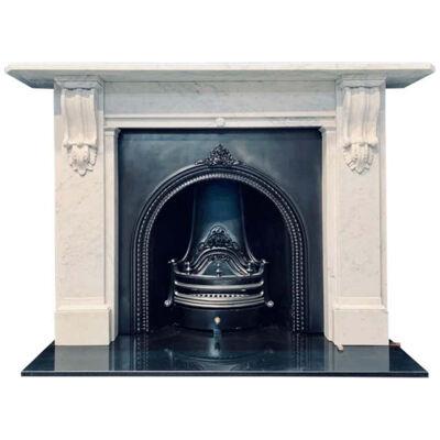 A Large 19th Century Victorian Carrara Marble Corbeled Fireplace Surround.