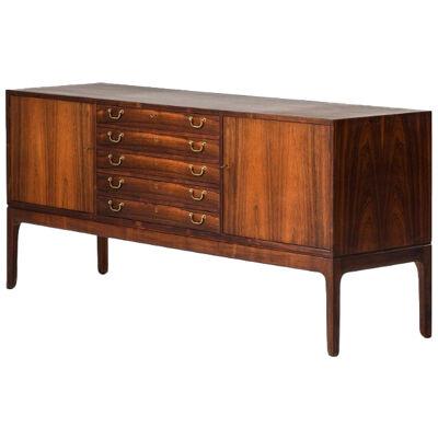 Sideboard in Rosewood and brass by Ole Wanscher