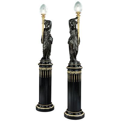 Pair of Bronze Figural Torchères on Stands