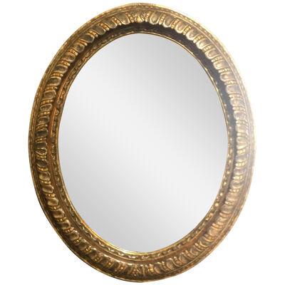 Oval mirror carved and decorated by hand with 800 style silver leaf