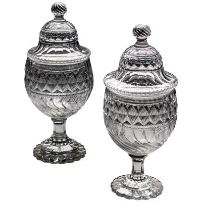 A PAIR OF GEORGE III CUT GLASS URNS & COVERS OF EXCEPTIONAL SIZE & QUALITY