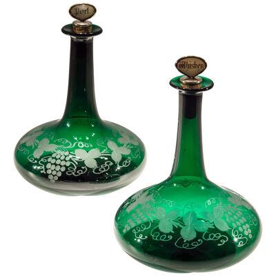 A Pair of Victorian Green Mells Decanters Engraved With Fruiting Vines