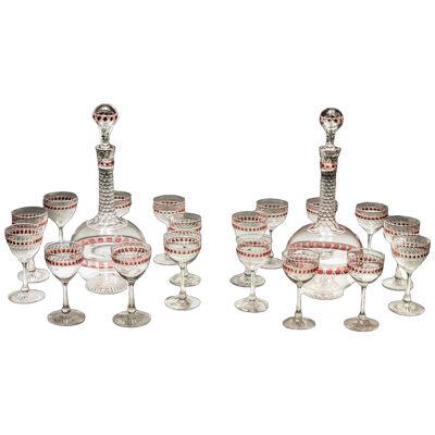 A Rare Pair of Victorian Red Flashed Globe Decanters With Matching Glasses