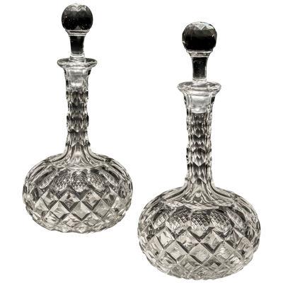 A pair of shaft and globe Victorian decanters