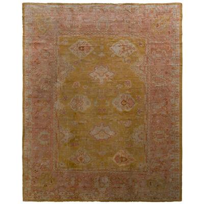 Hand-Knotted Antique Oushak Rug in Gold and Pink Floral Pattern