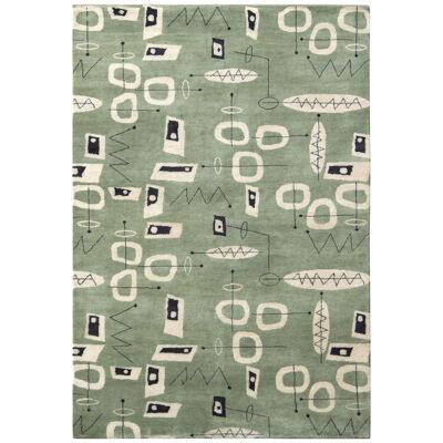 Rug & Kilim’s Mid-Century Modern Rug in Green and White Geometric Patterns