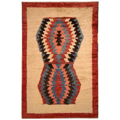 Rug & Kilim’s Tulu Tribal Style Rug in Beige and Red Geometric Pattern
