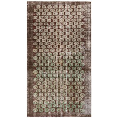 Hand-Knotted Vintage Mid Century Distressed Rug in a Brown, Green Floral Pattern