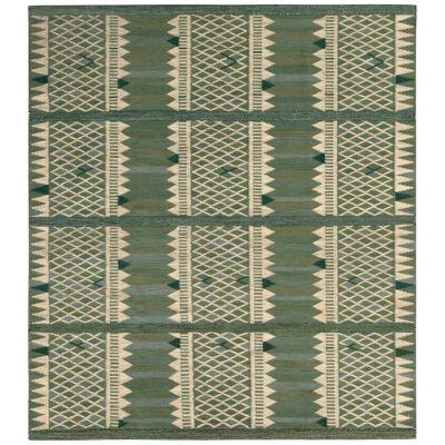 Rug & Kilim’s Scandinavian Style Kilim Rug in Green and Beige Geometric Pattern