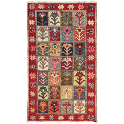 Vintage Persian Tribal Rug with Vibrant Geometric-Floral Patterns by Rug & Kilim