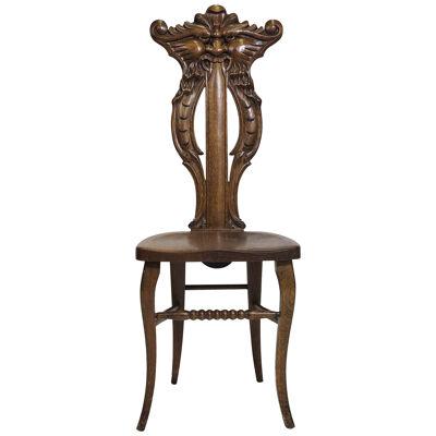 1910 Whimsically Carved Northwind Oak Chair