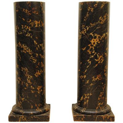 A PAIR OF MID 19TH CENTURY SIMULATED MARBLE COLUMNS