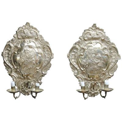 A PAIR OF SILVERED WALL SCONCES