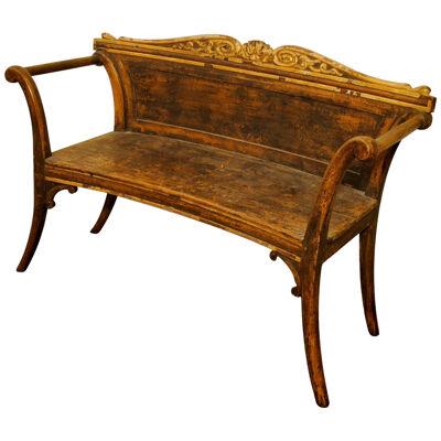 A SCANDINAVIAN PAINTED AND PARCEL GILT HALL BENCH
