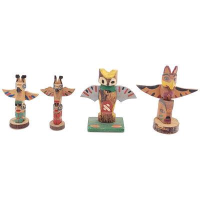 Group of Four Vintage Small Totem Poles