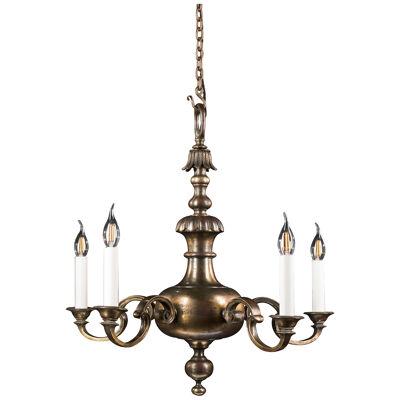 A Patinated Brass Baroque Style chandelier