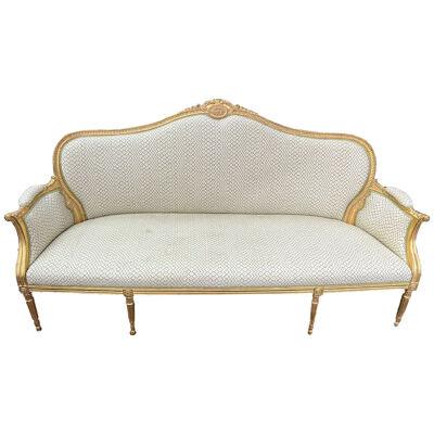 Large Louis XVI style gilt wood sofa, circa 1900